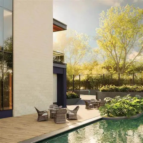 Alfresco deck and garden seating area at Sobha Aurum